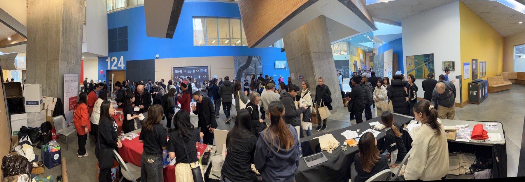 Festival attendees gathering in the MIT lobby.